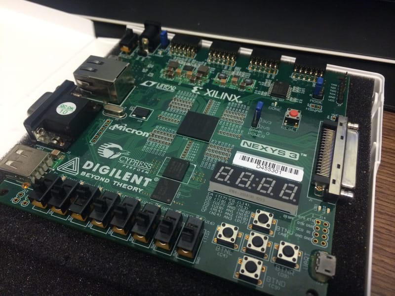 Close up of the Nexys 3 Spartan 6 FPGA board used throughout Intro to Digital and Advanced Design.