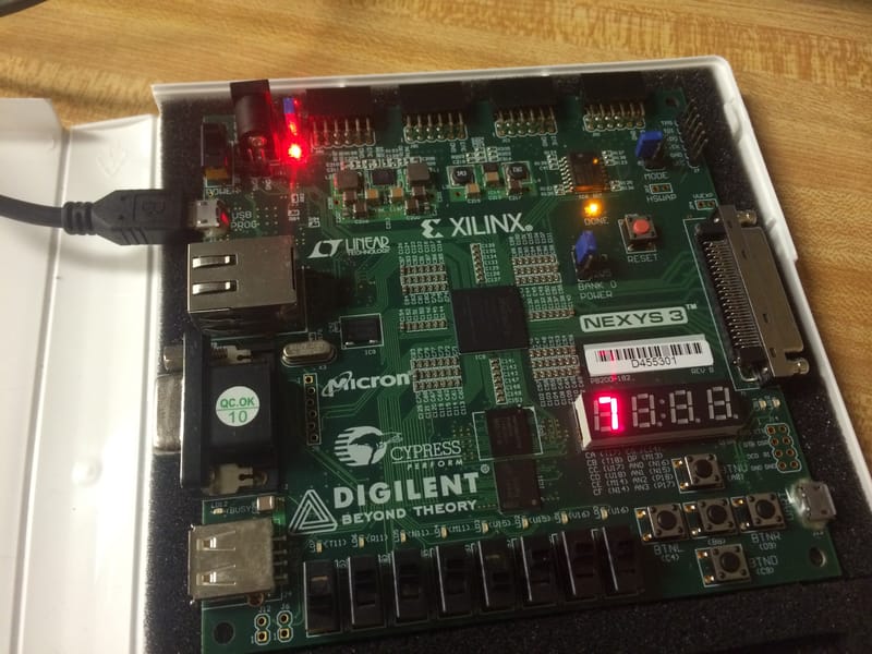Manually toggling switches (binary) to show hex values on the 4x 7-segment displays.