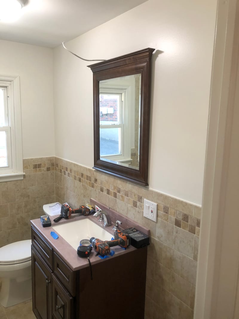 Vanity Mirror Installed Above Half Wall