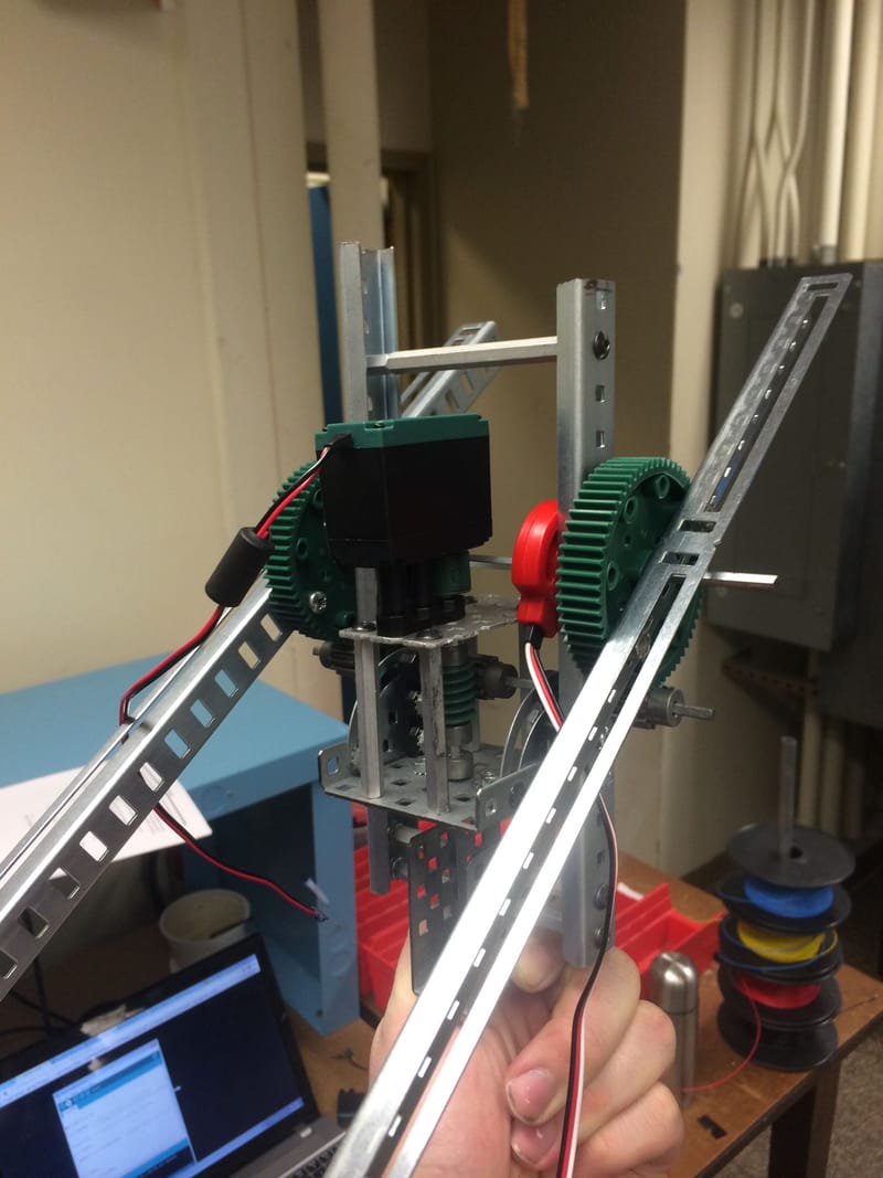 Rotating arm mechanical assembly coming together.