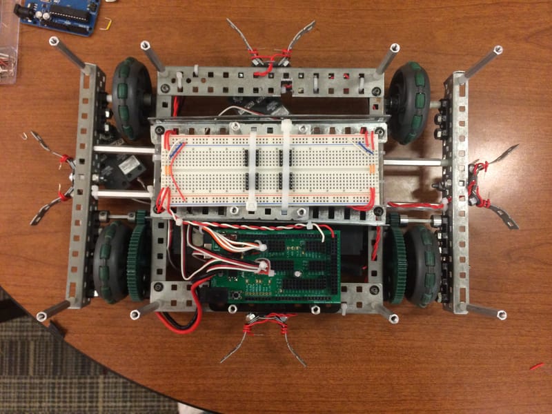 Top view — wiring cleaned up with four conductive sensors on the ends.