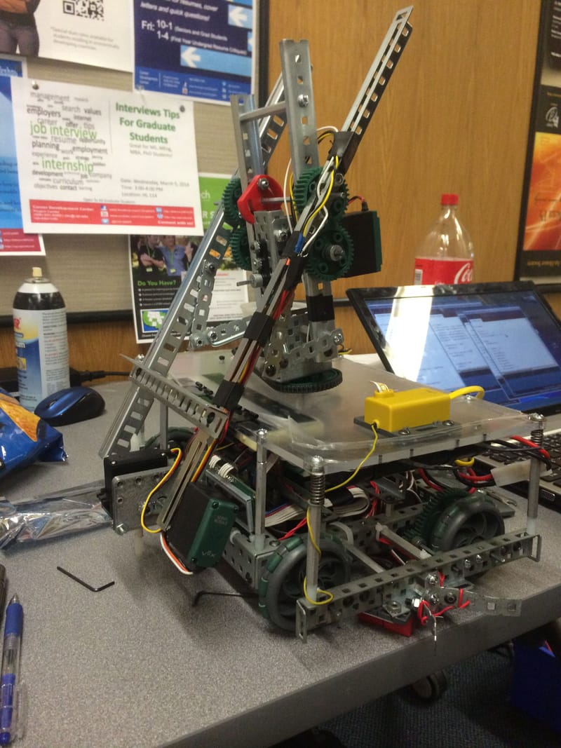 Lowest reach of the robotic arm with 3D printed adapter.