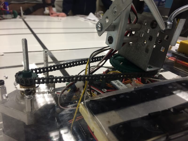 Tensioning the VEX chain — removing a link to reduce jitter.