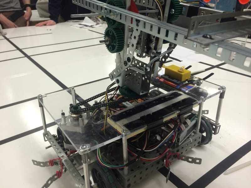 Robot in action during testing on the competition field.